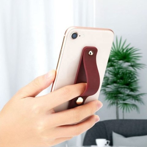 Samoprzylepny uchwyt do telefonu na palec z suwakiem różowy Samoprzylepny uchwyt do telefonu na palec z suwakiem różowy